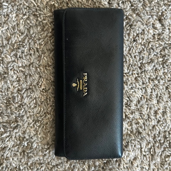 Prada Handbags - Prada black leather wallet